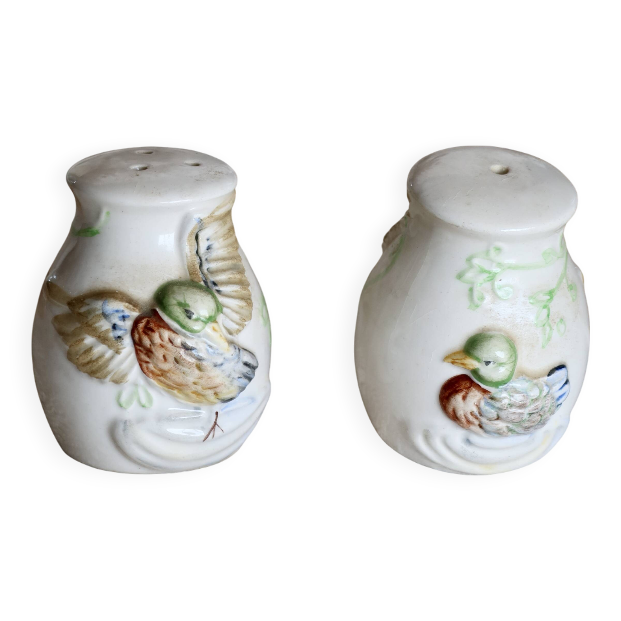 Vintage earthenware and slip salt and pepper shakers with duck motif