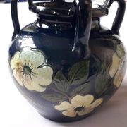 Antique art nouveau vase with floral decoration