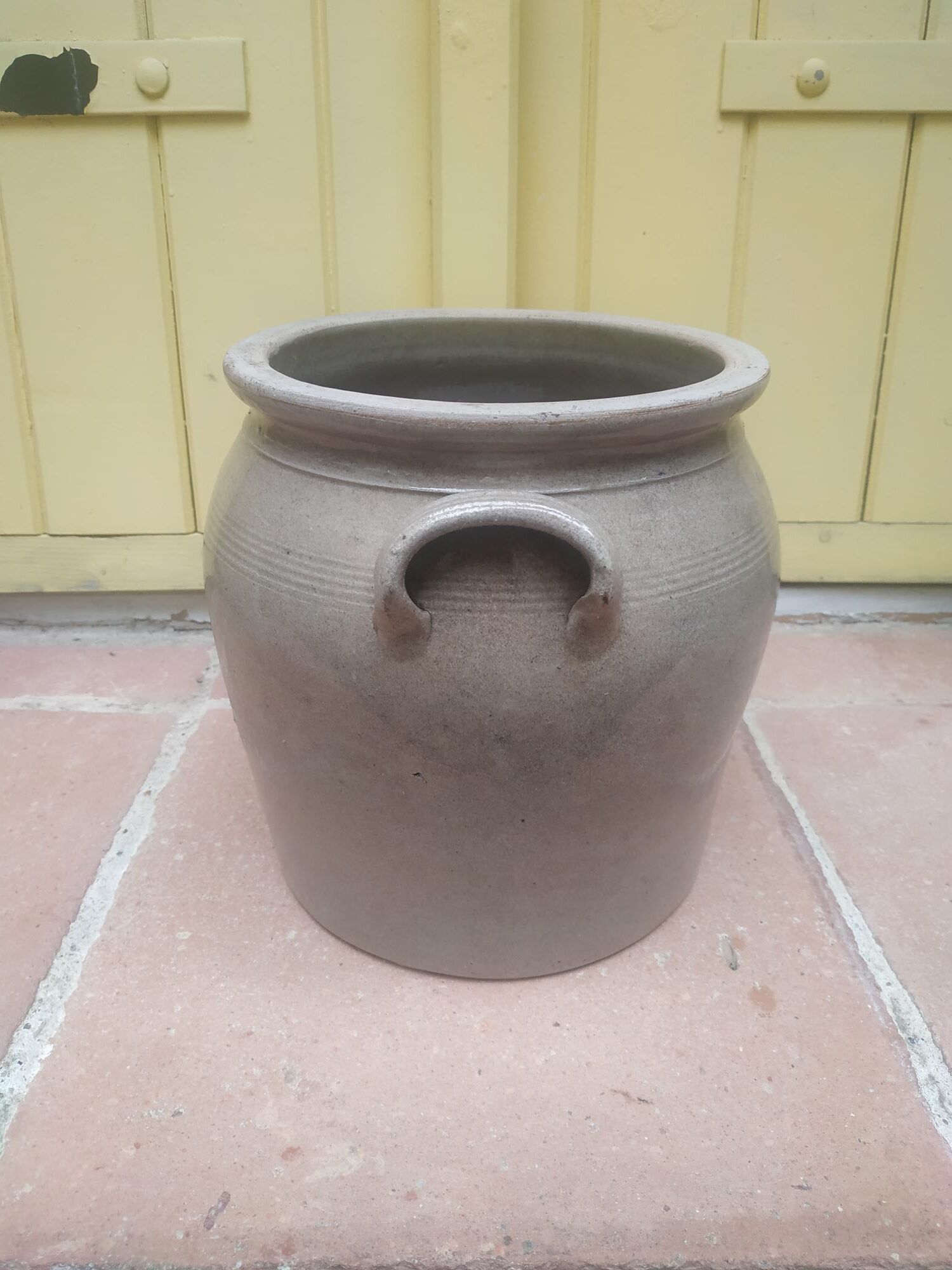 Old grease maker with two handles in gray glazed sandstone early 20th century