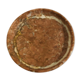 Empty pocket on foot in red marble