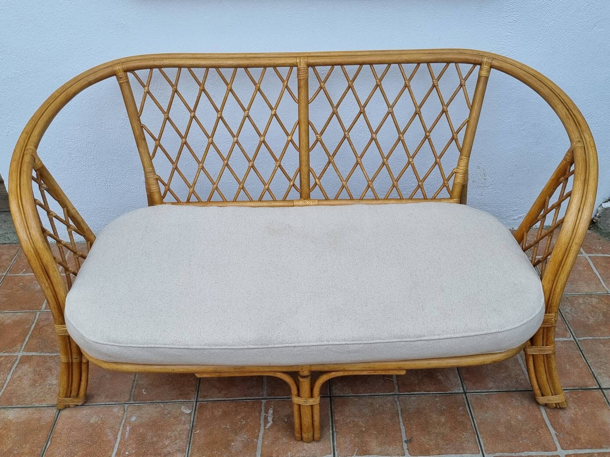 Vintage two-seater natural rattan sofa with cotton cushions, 140 cm
