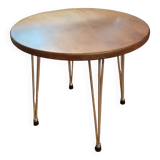 Round side table serving Eiffel leg oak top
