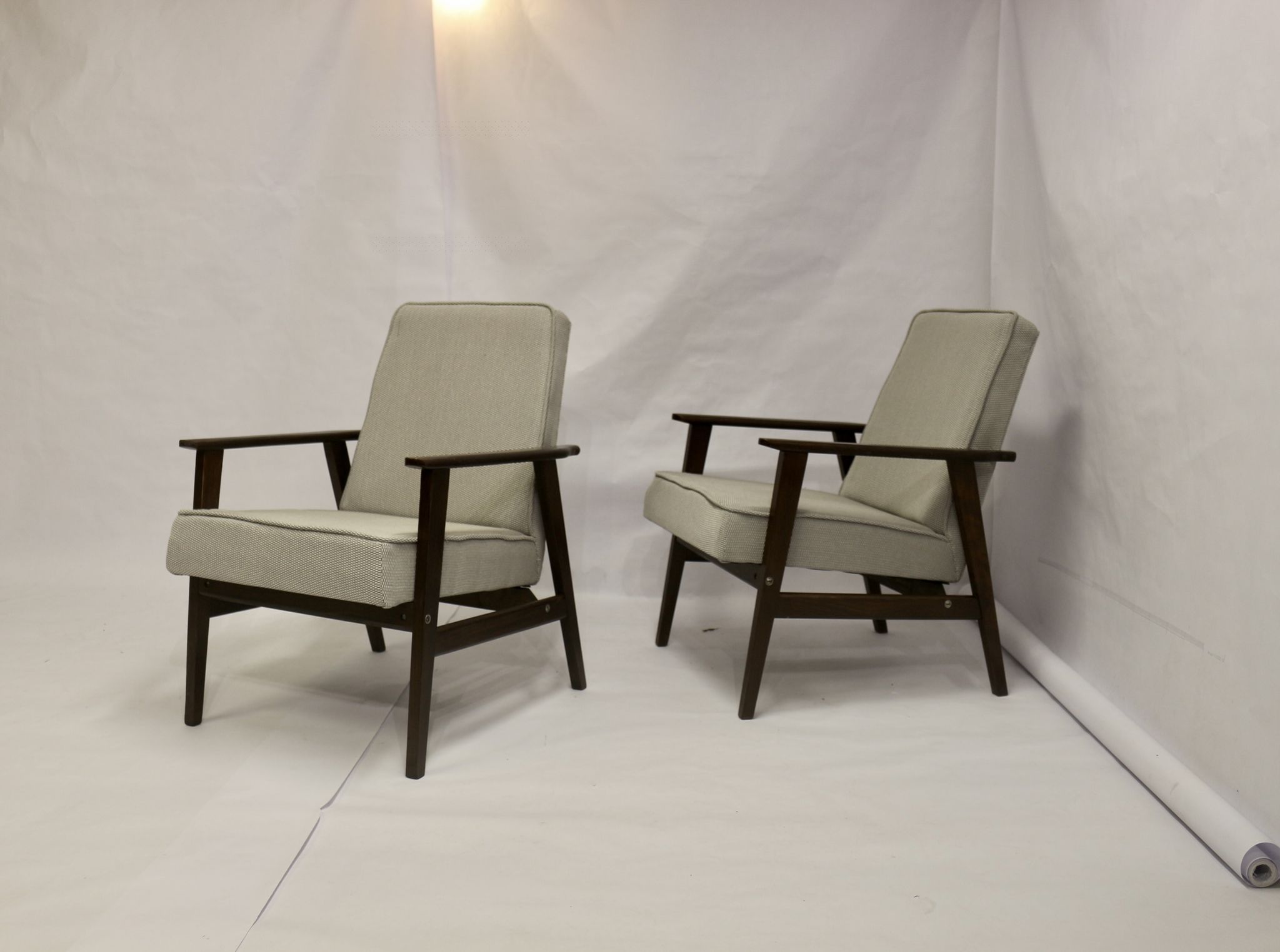 Pair of Henryk Lis armchairs 300-190s 1970s reupholstered gray textured fabric.