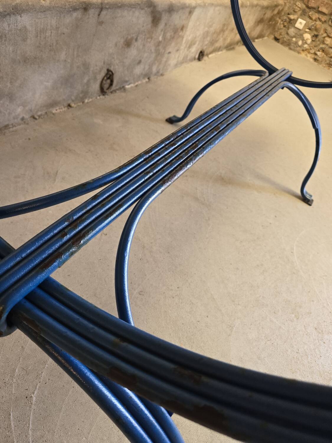 Wrought iron and solid wood table