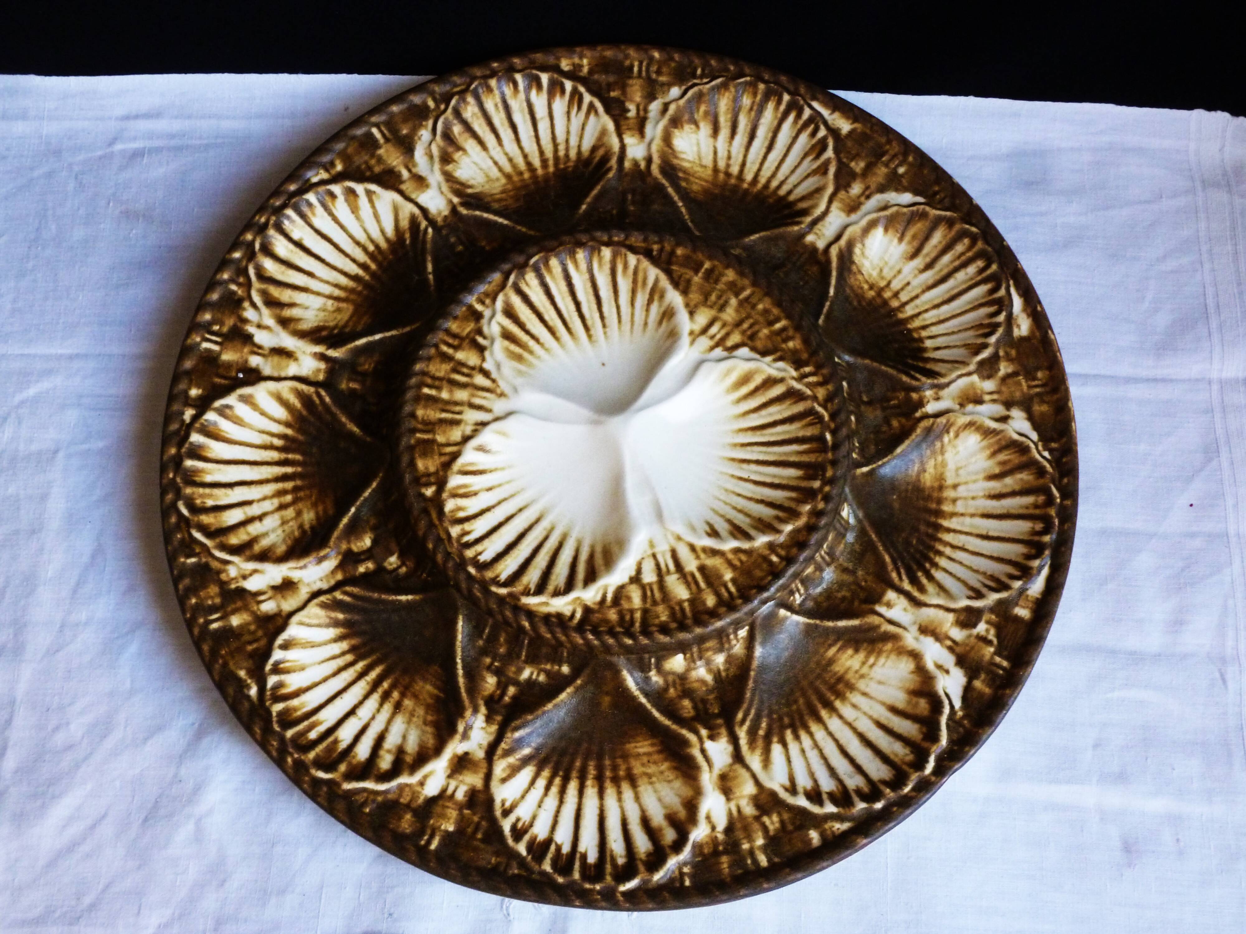 Oyster service, platter and 6 Longchamp oyster plates.