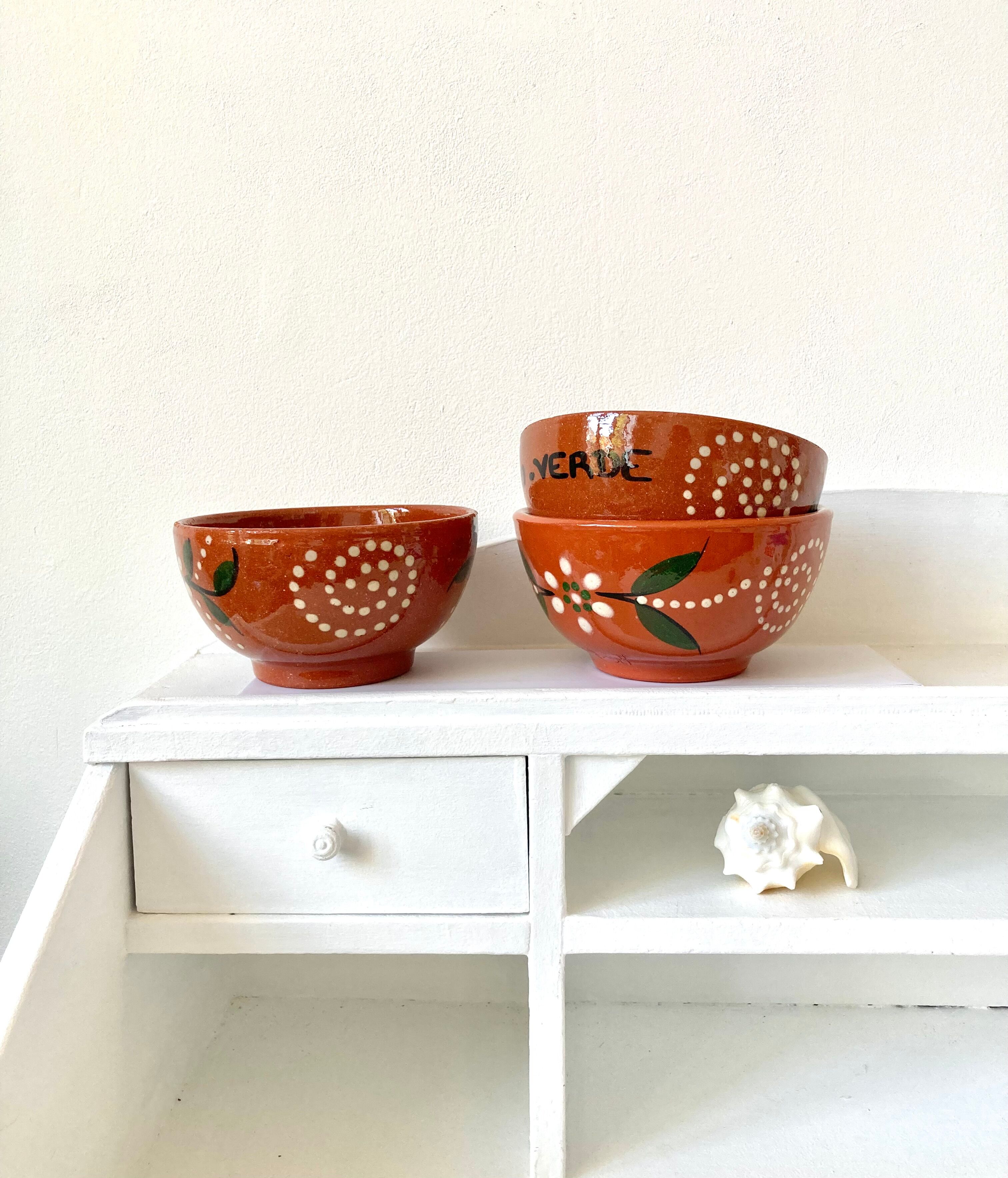 Vintage terracotta bowls decorated flowers