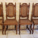 Set of 4 vintage carved cane chairs