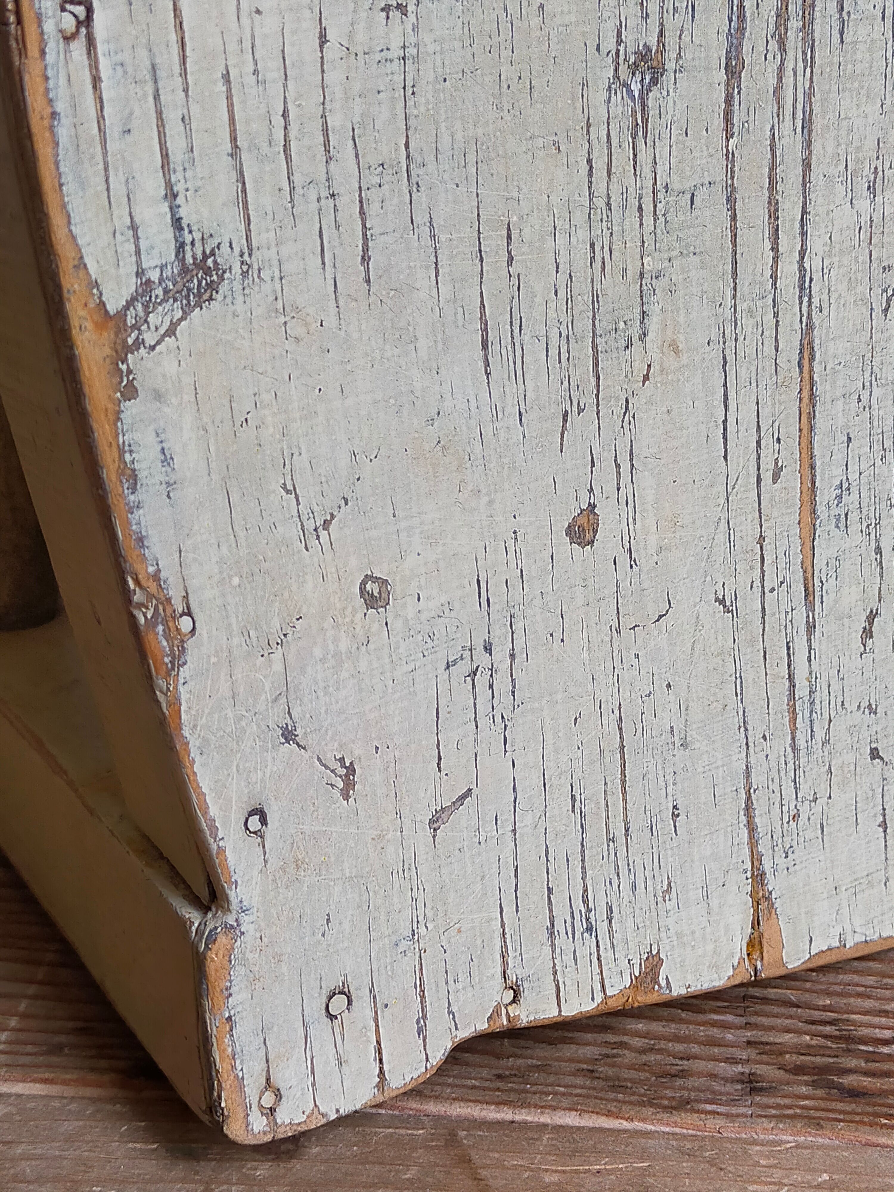 Old patinated painted wooden stool