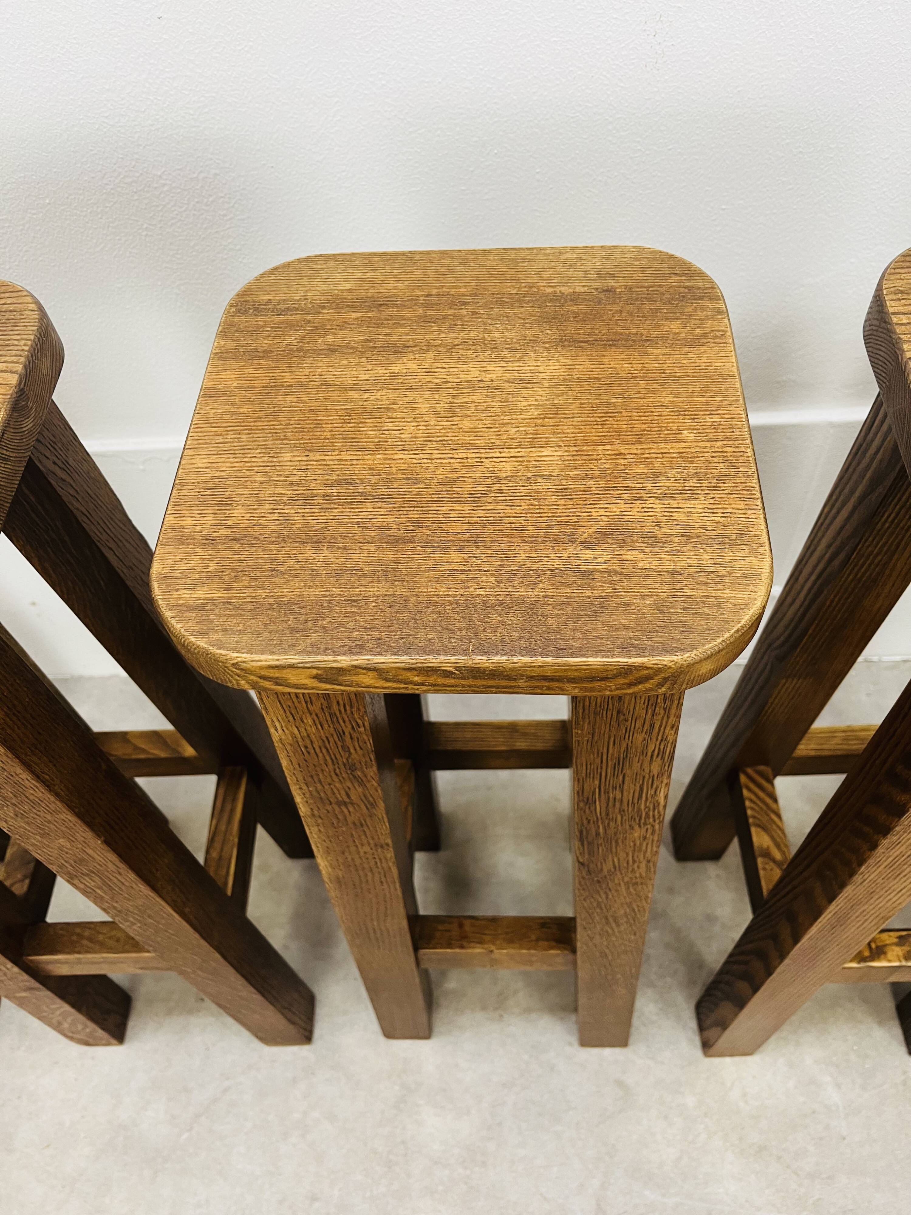 8 solid wood bar stools in brutalist style