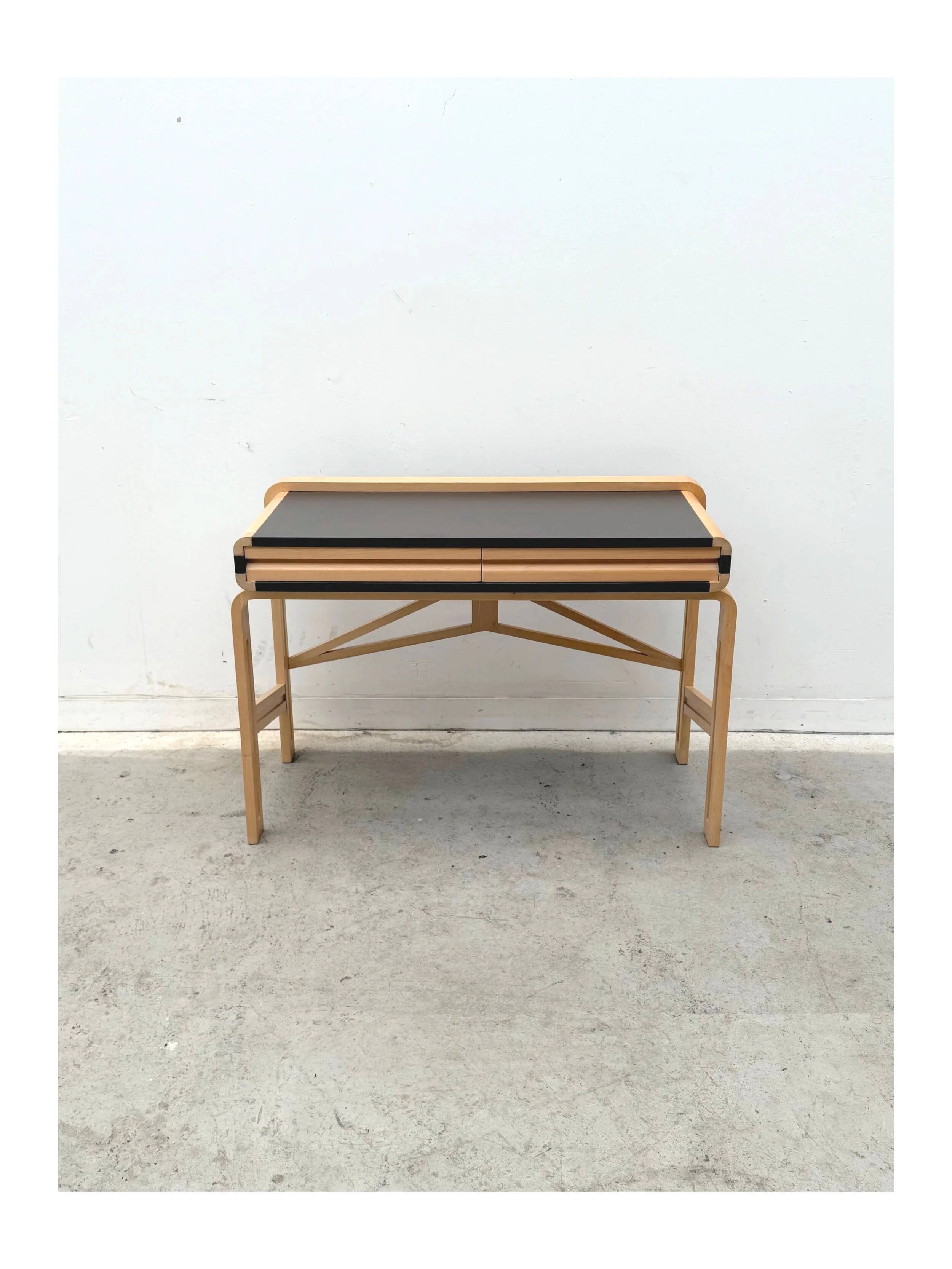 Solid wood and formica desk made by a cabinetmaker.
