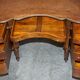 Regency style hardwood and leather kidney desk with gallery.