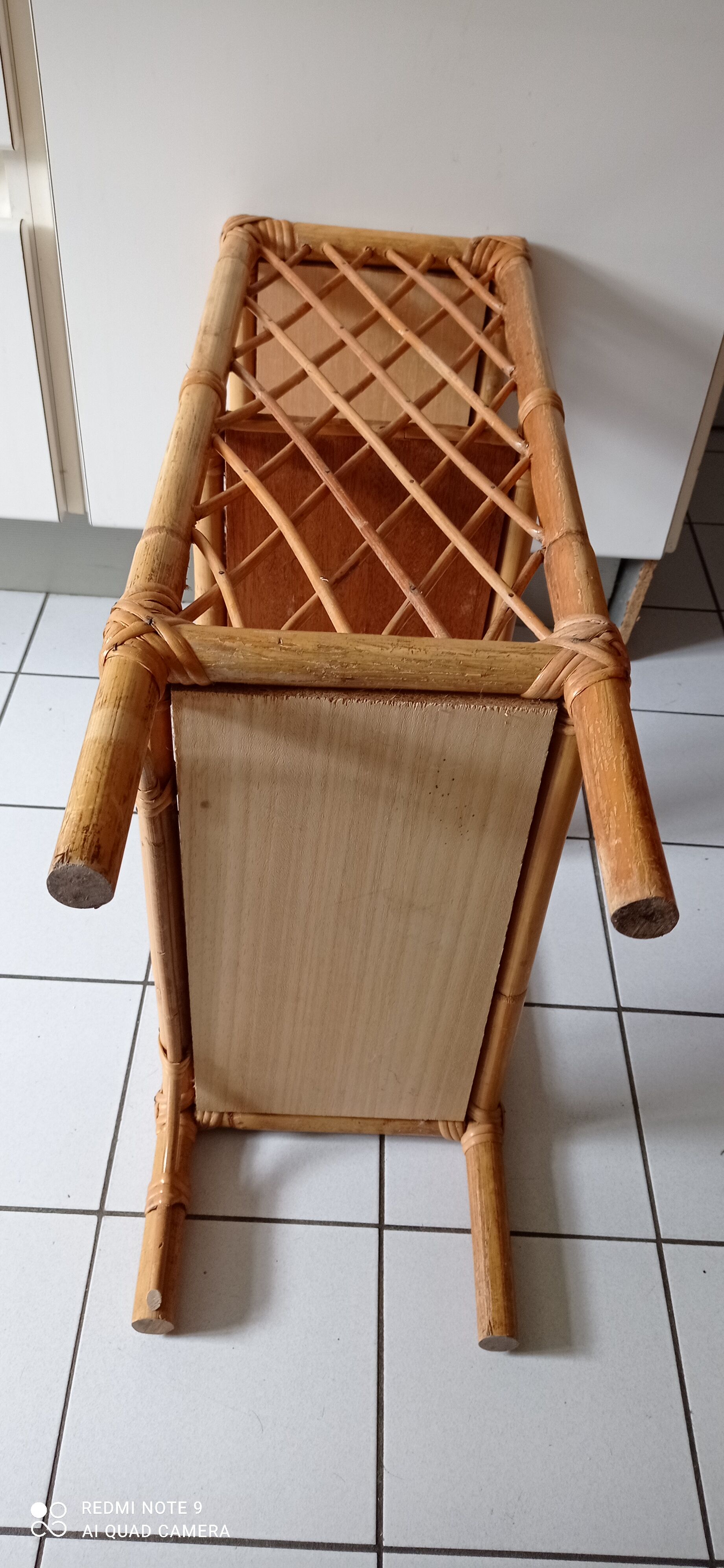 Old shelf on vintage rattan stands