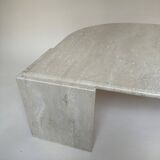 Travertine eye-shaped coffee table