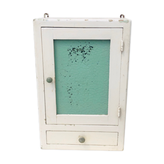 White medicine cabinet with window and drawer