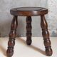 Vintage solid turned wood tripod stool