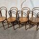 Set of 4 wooden and cane bistro chairs