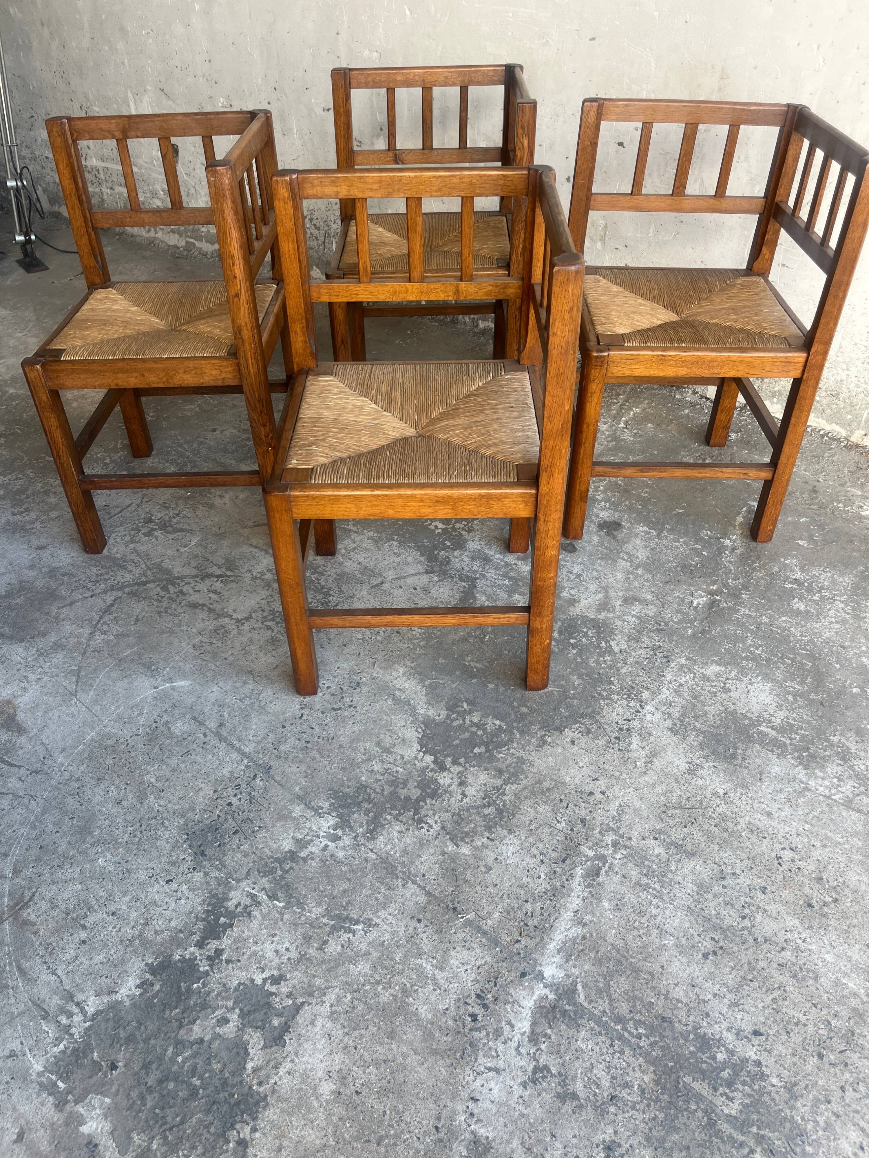 Set of 4 brutalist oak armchairs, 1950s