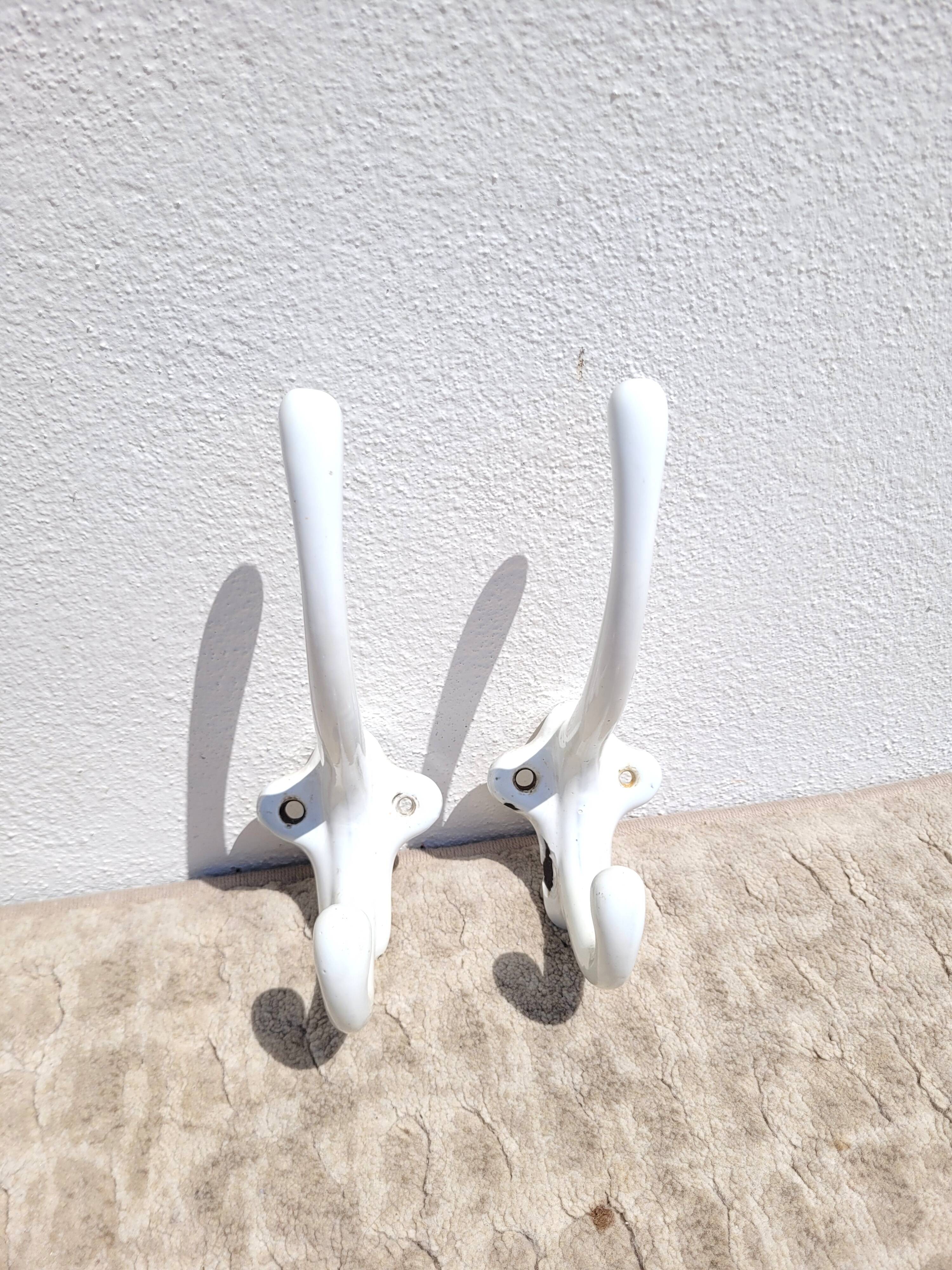 Pair of double coat hooks in enameled cast iron