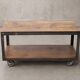 Industrial coffee table in metal and wood, wheeled table, trolley, vintage table, interior decoration.