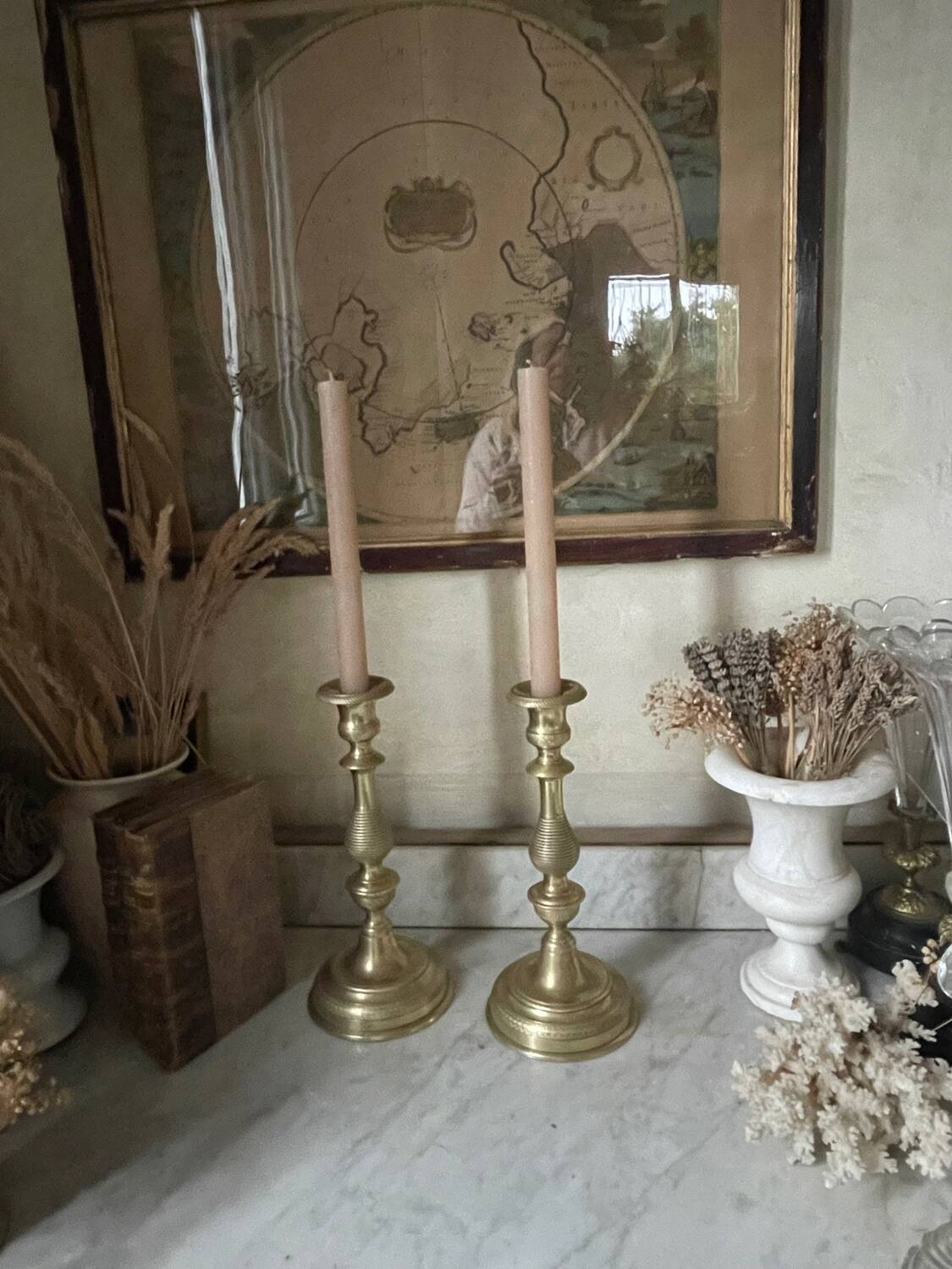 Antique pair of gilded bronze candlesticks