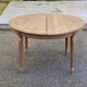 Renovated round Art Deco dining table, extendable, made of solid oak, 145cm.
