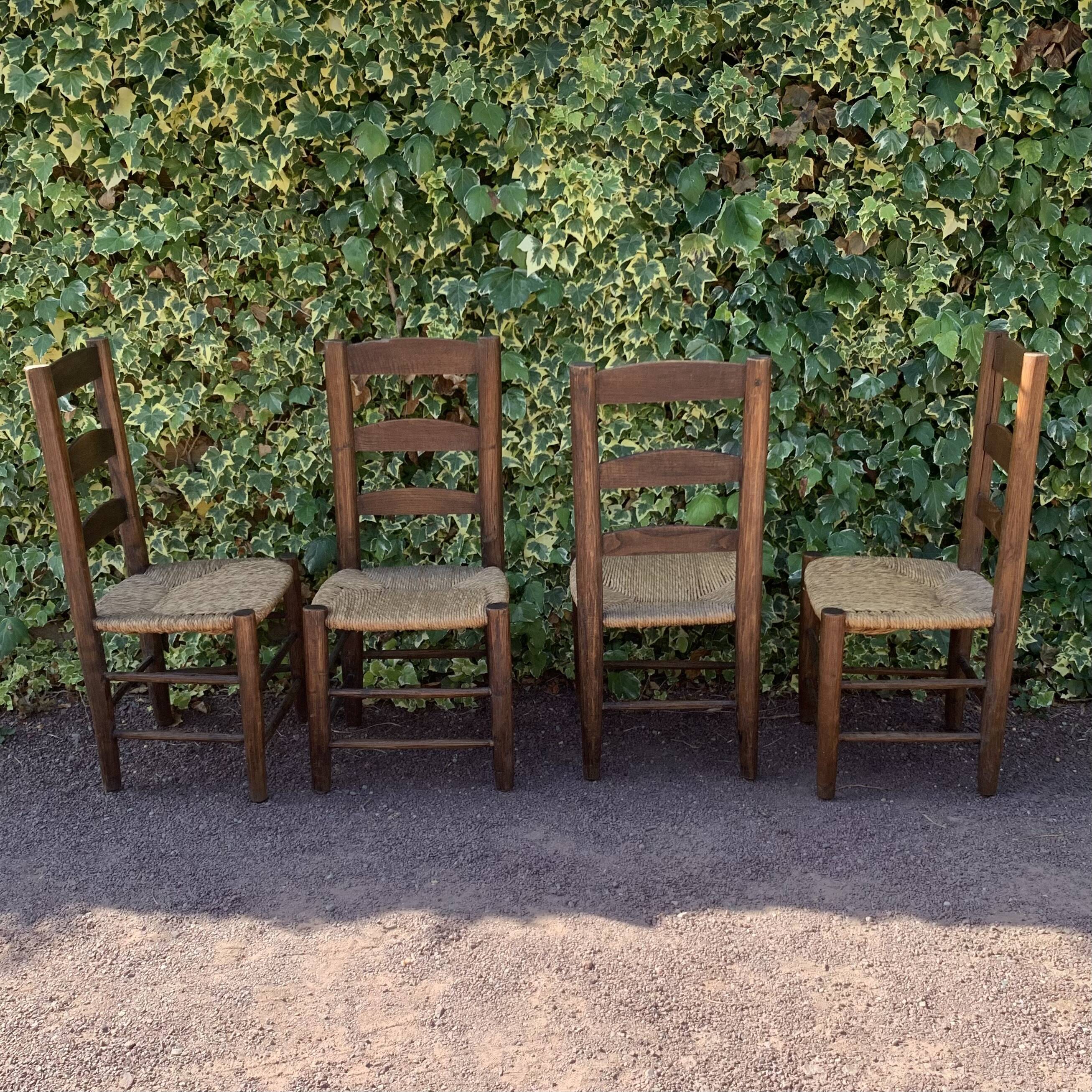 Set of 4 handcrafted rush chairs in solid oak.