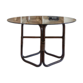 Round dining table in rattan, smoked glass top, 1970s.