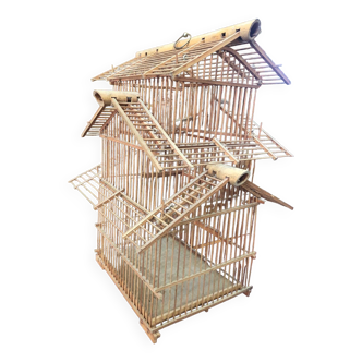 Old pagoda bird cage in bamboo and wood