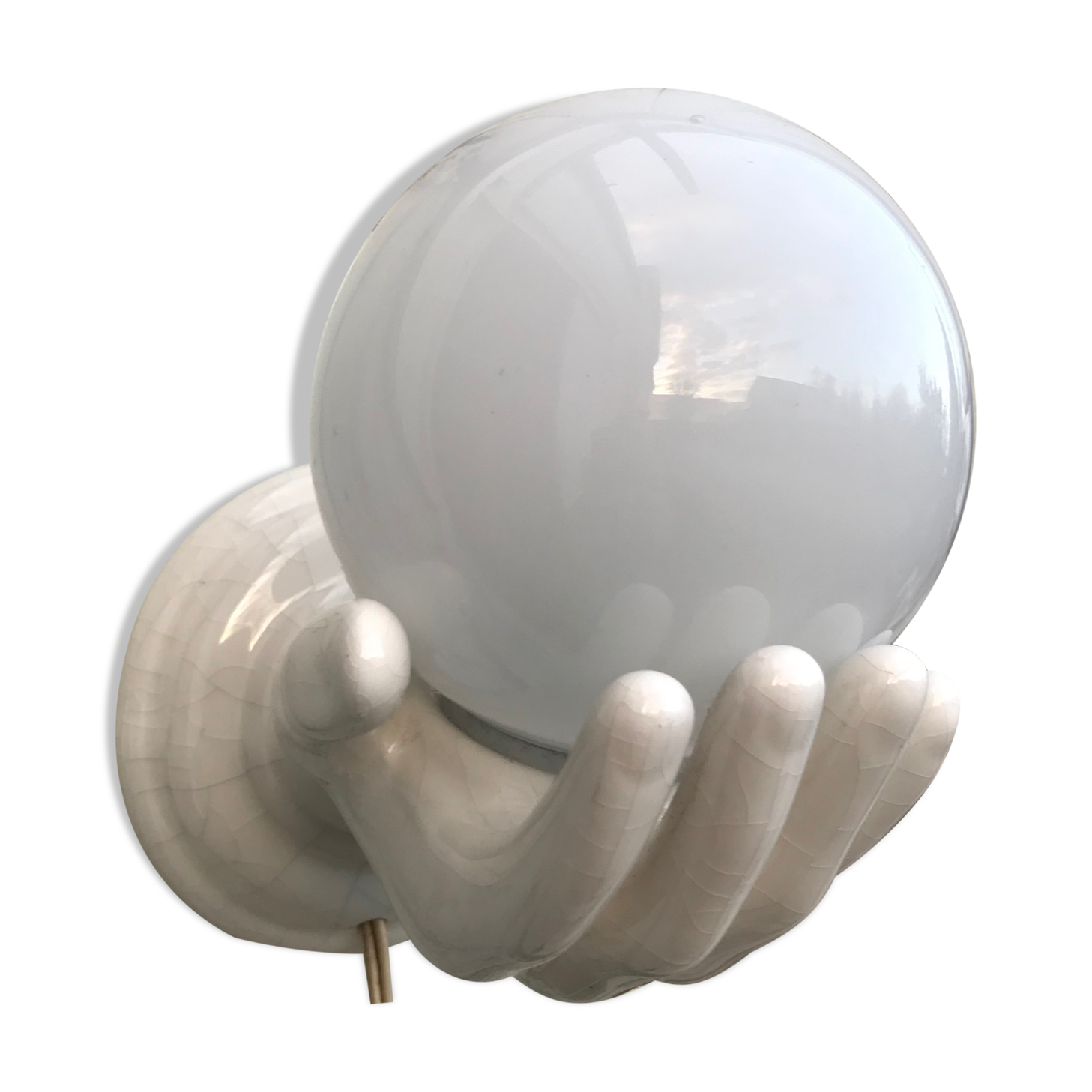 Hand-shaped ceramic wall light