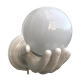 Hand-shaped ceramic wall light