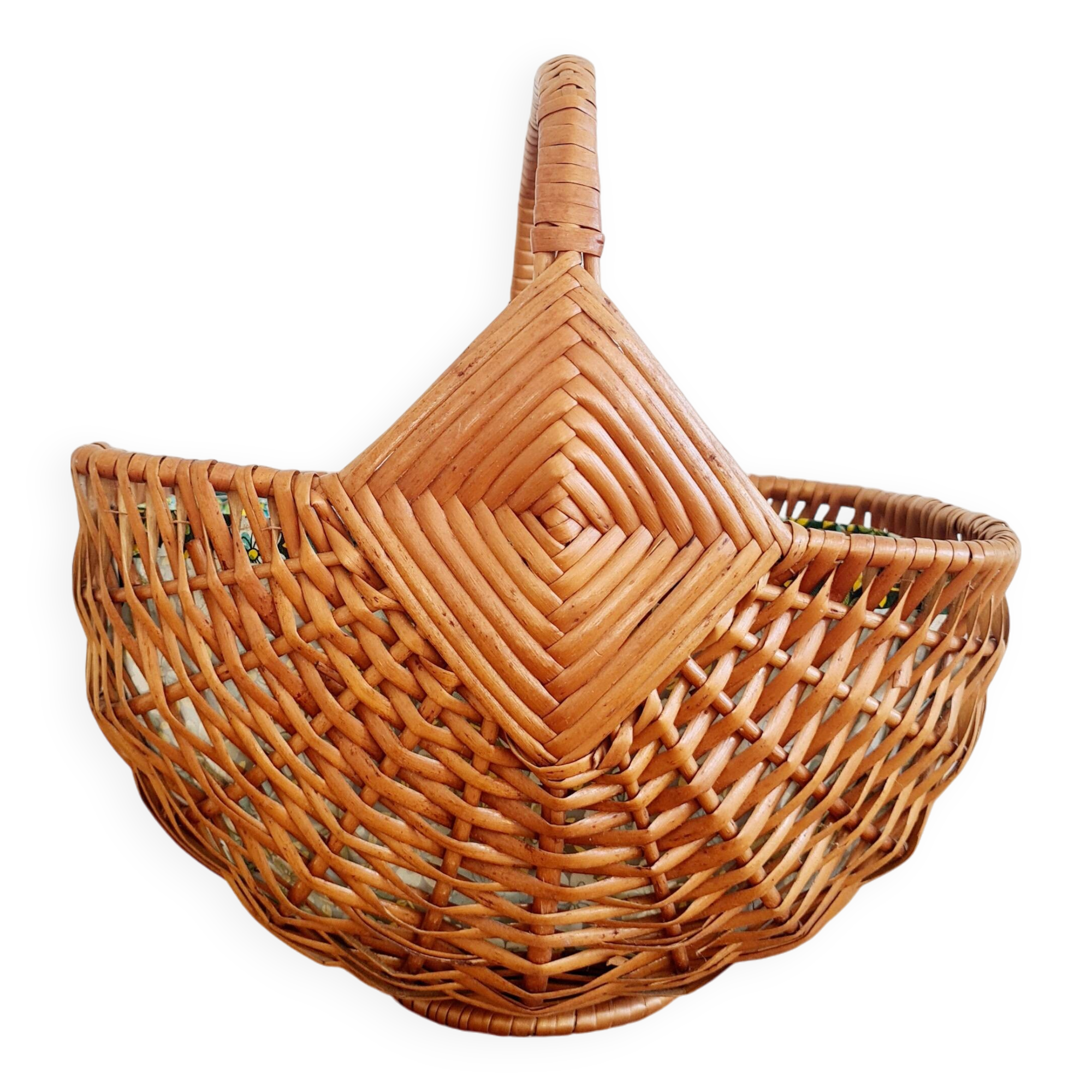 Small old basket with floral fabric interior