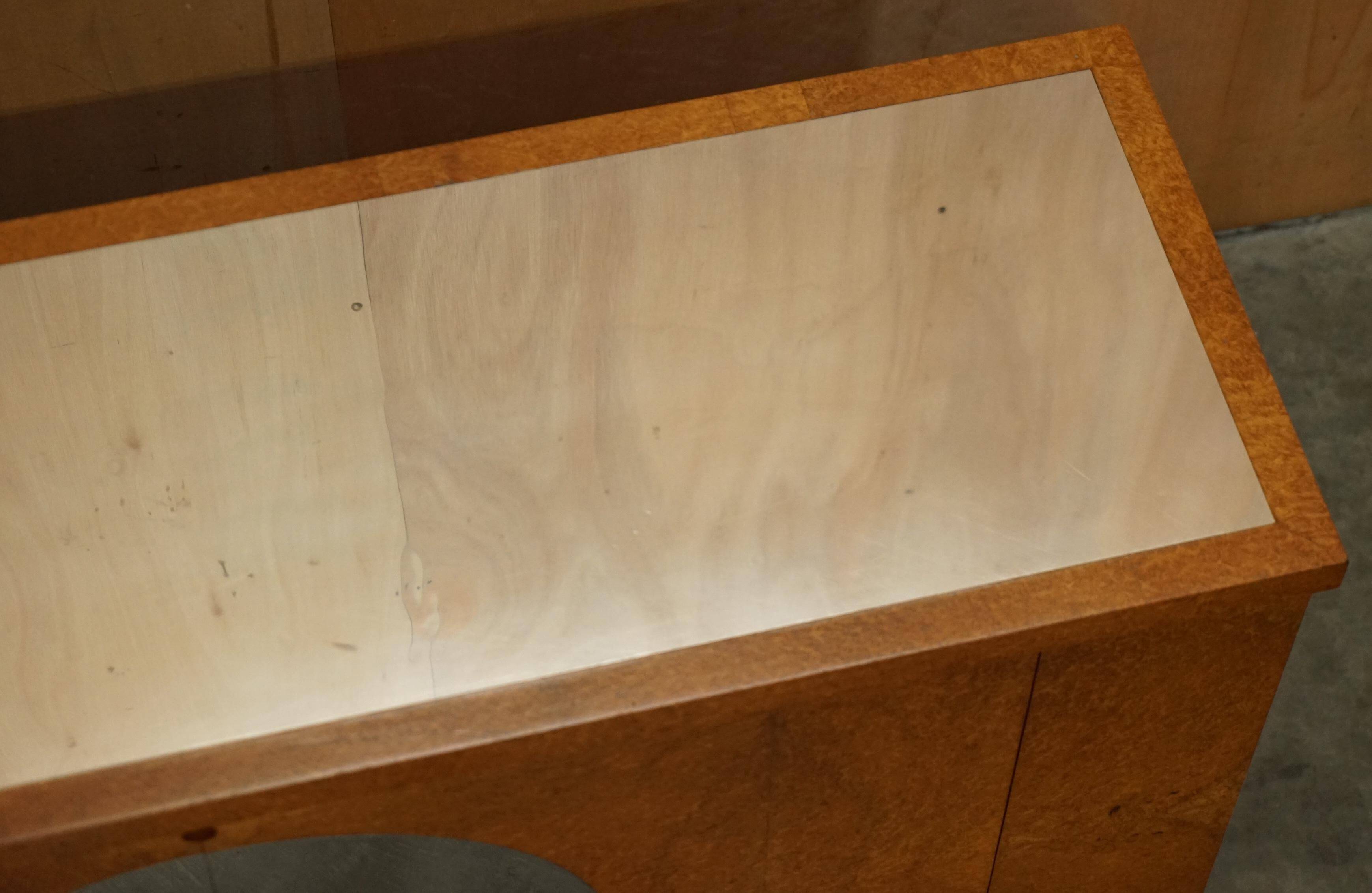 Soane Britain buffet for Bentley in Amboyna burl wood and polished metal.