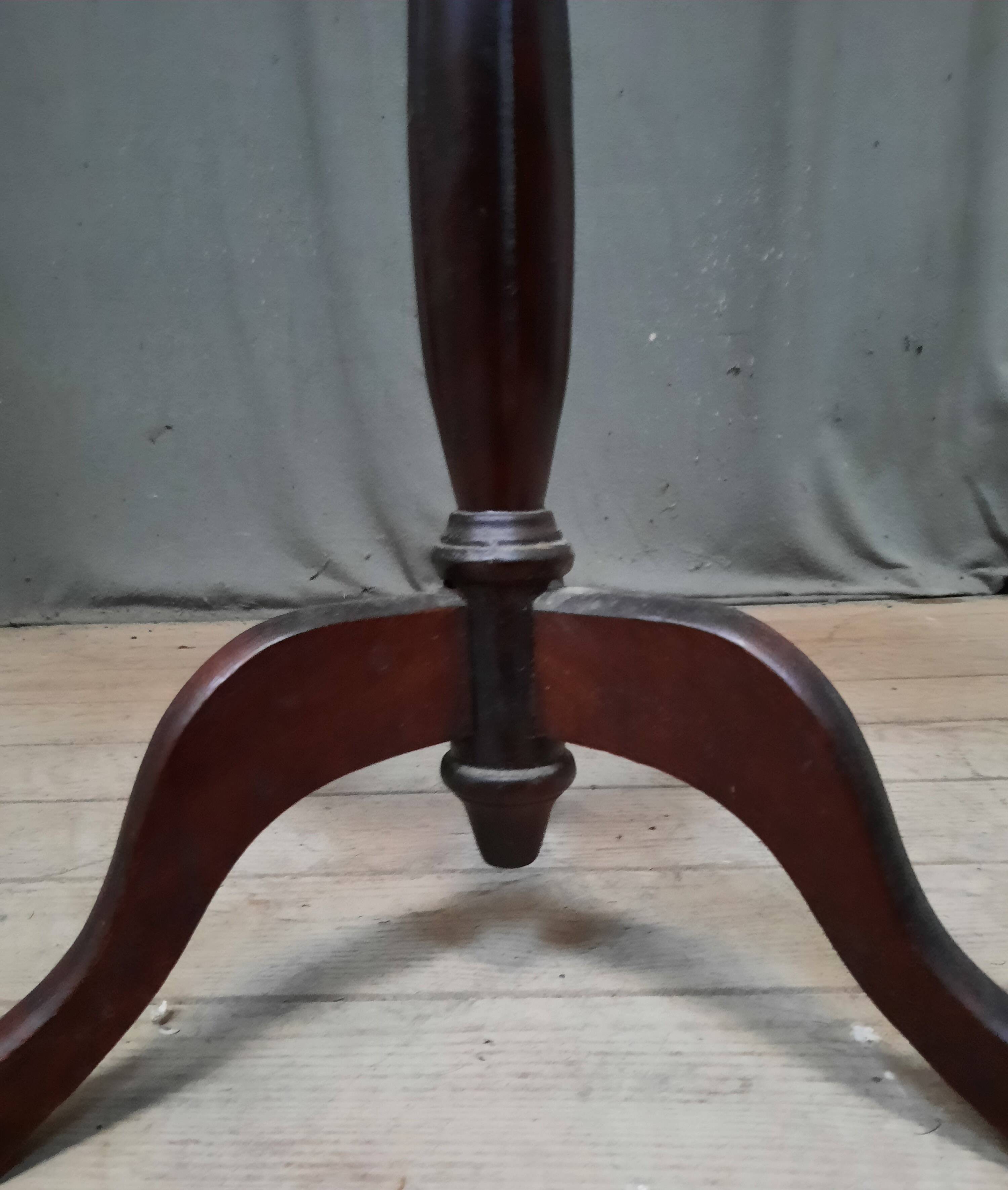 Small marble top pedestal table