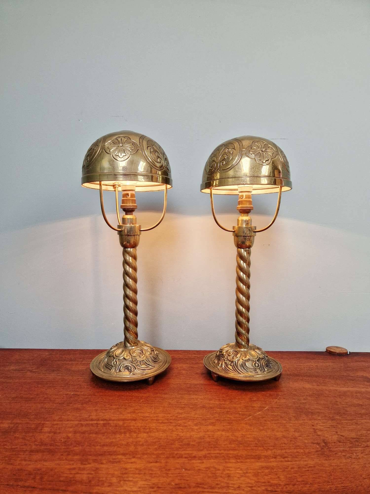 Pair of bronze and brass table lamps, early 20th century