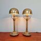 Pair of bronze and brass table lamps, early 20th century