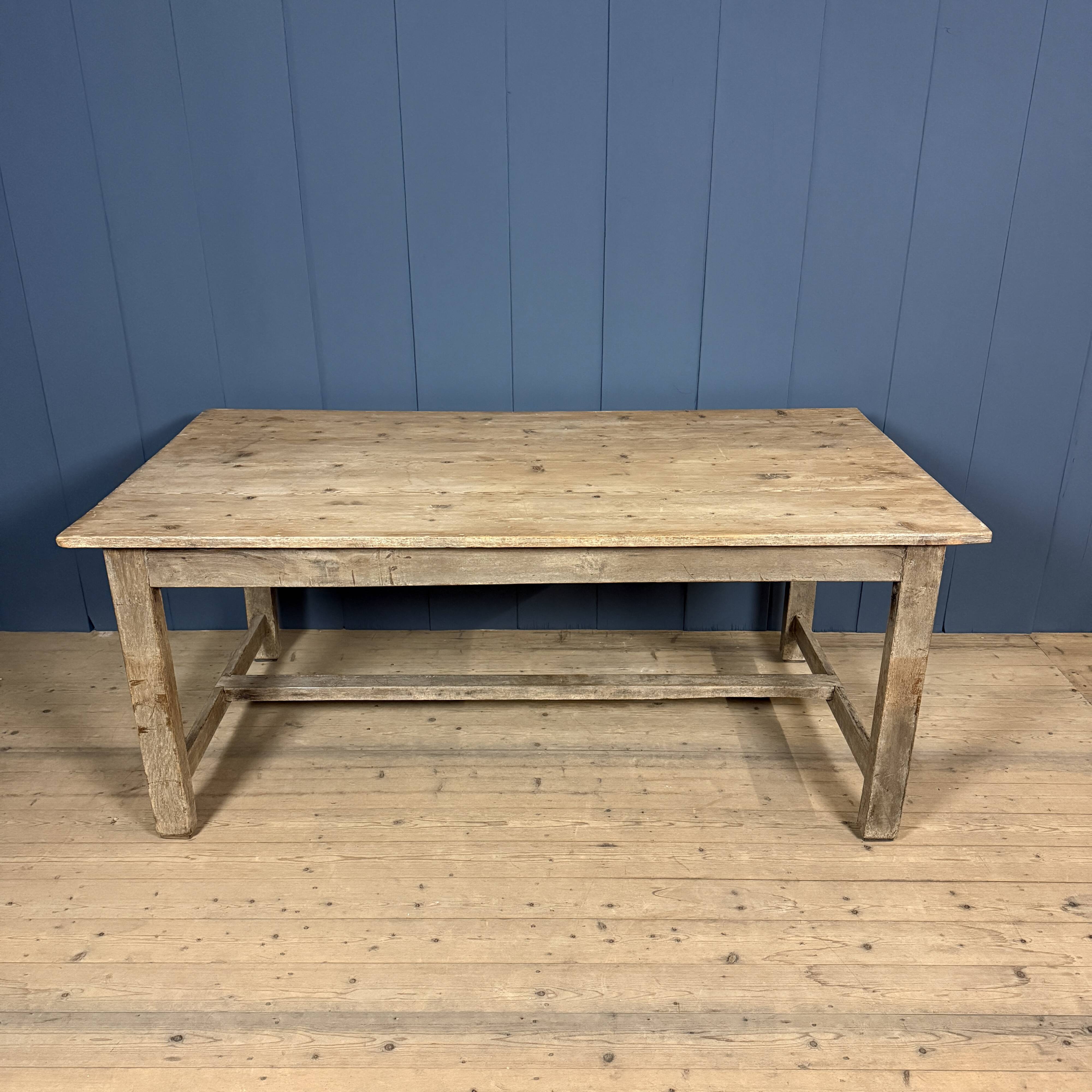 French farmhouse dining table with pine top and oak base
