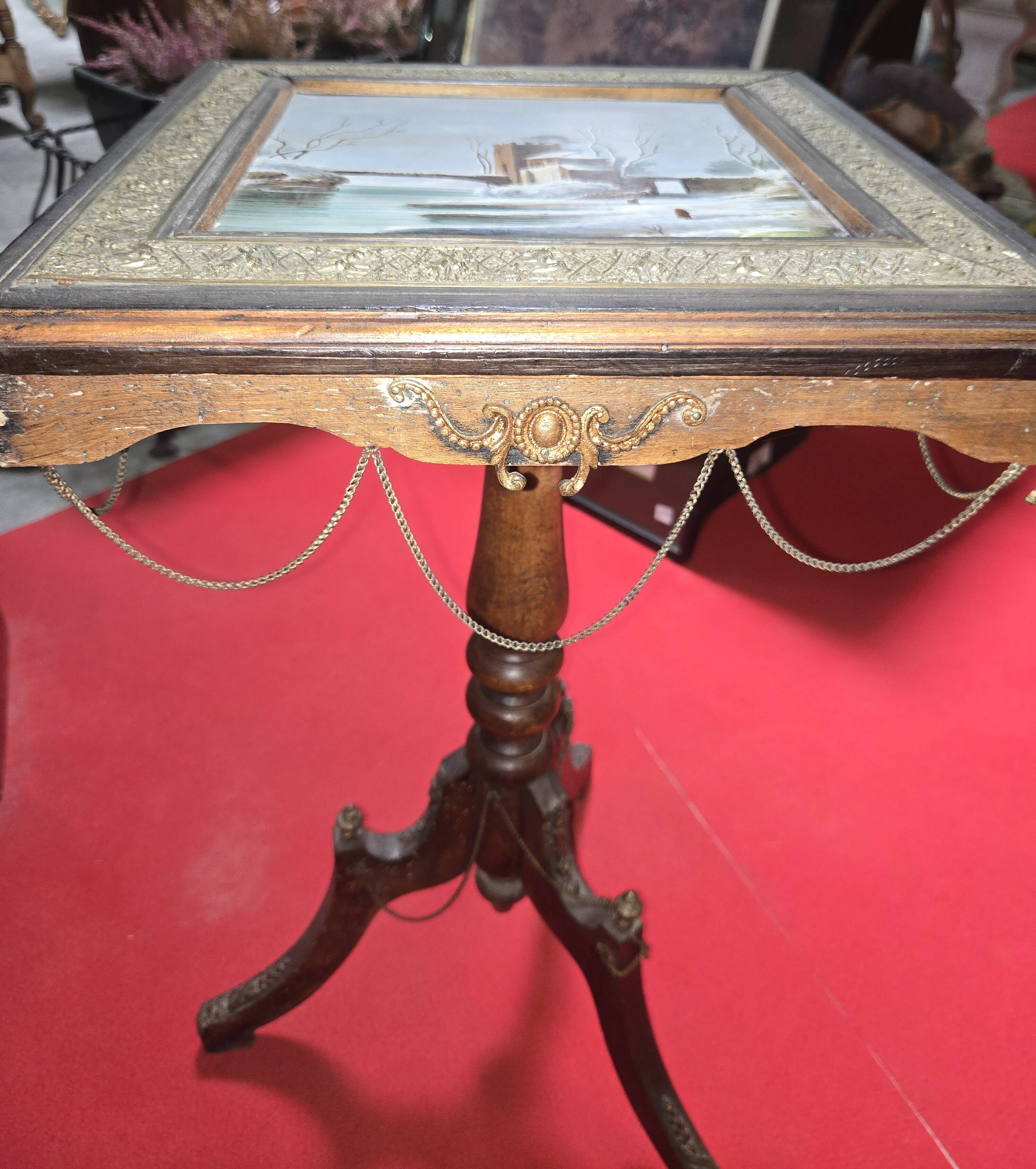 Napoleon III guéridon table with a painted porcelain top.