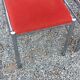 Pair of designer chairs in chrome metal and orange velvet from the 1970s.