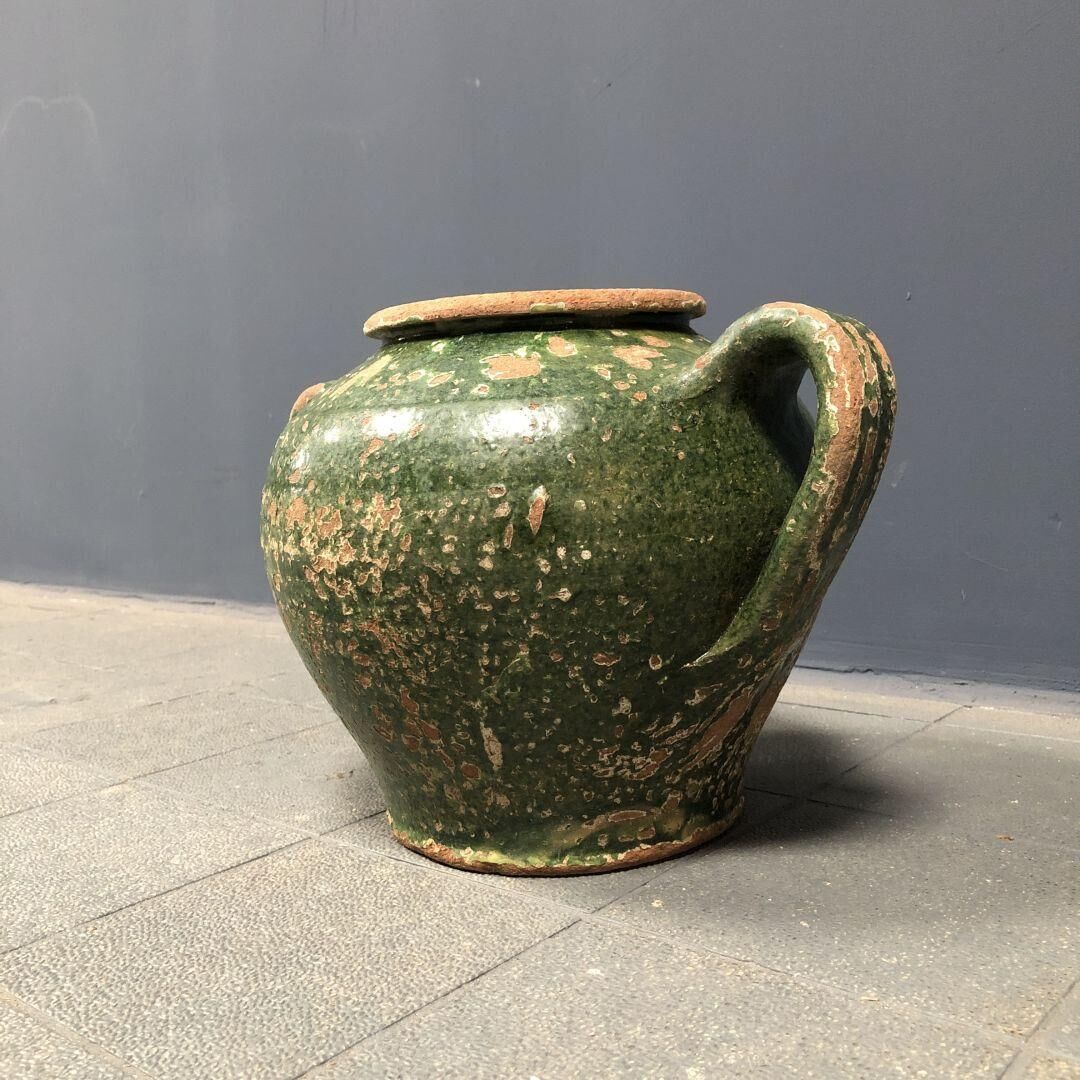 Dark green jug enamelled