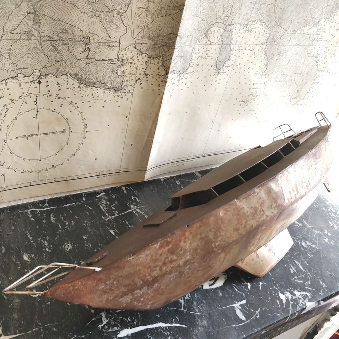 Vintage boat model in patinated metal