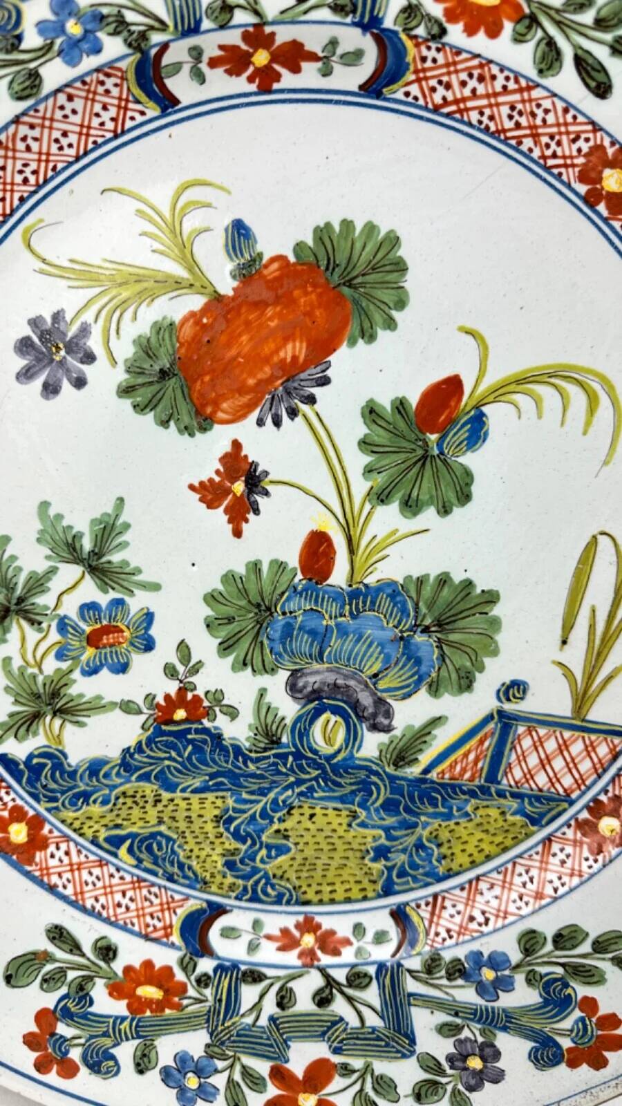 Delftware plate with gilded highlights, relief decoration, 18th century, 35 cm