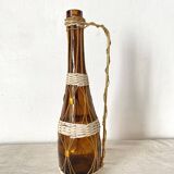 Amber glass bottle and scoubidou