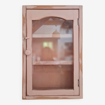 Medicine cabinet in patinated pink wood