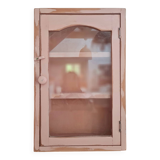 Medicine cabinet in patinated pink wood