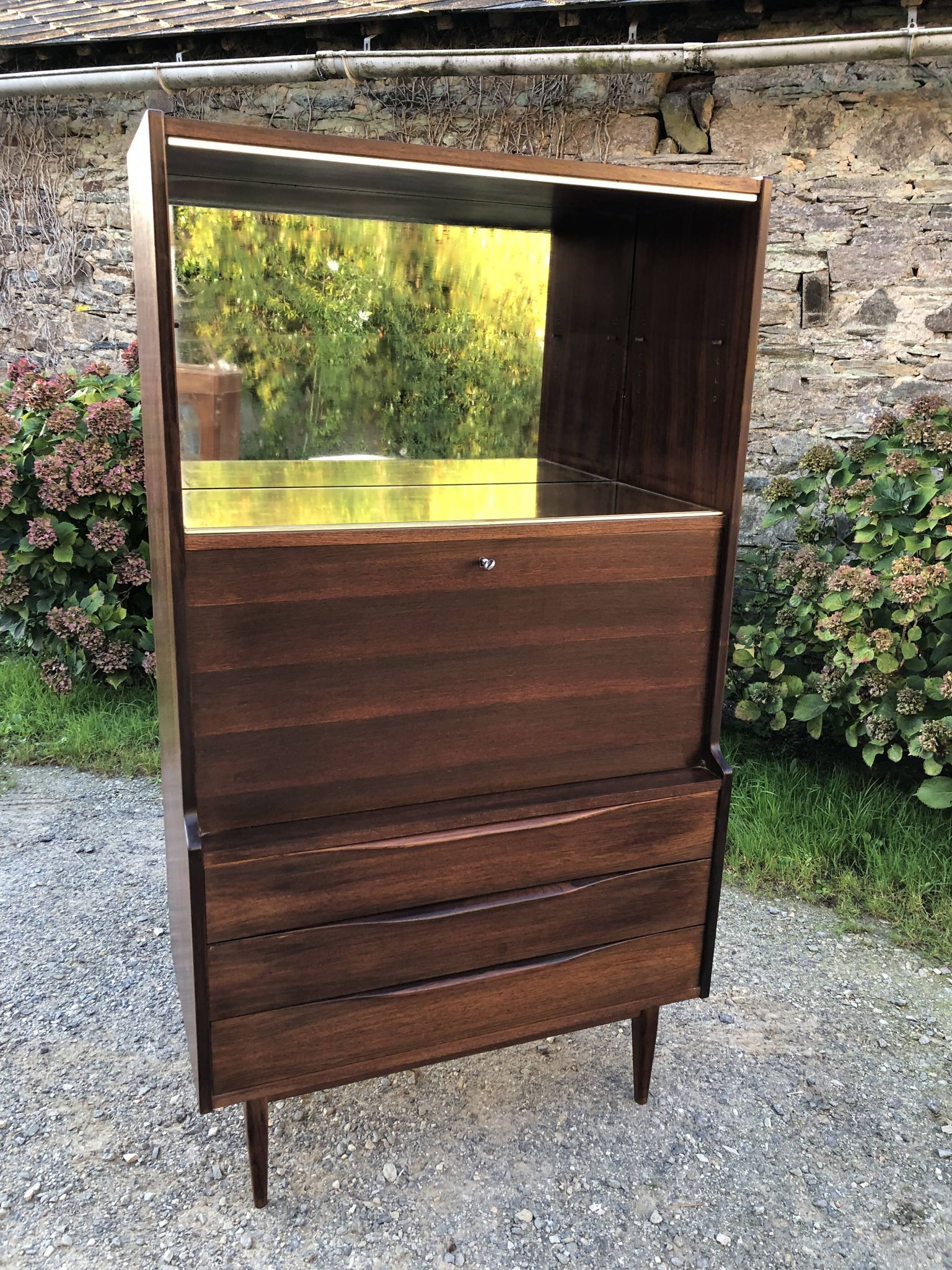 Vintage Scandinavian secretary in rosewood with drawers featuring fin-style handles.