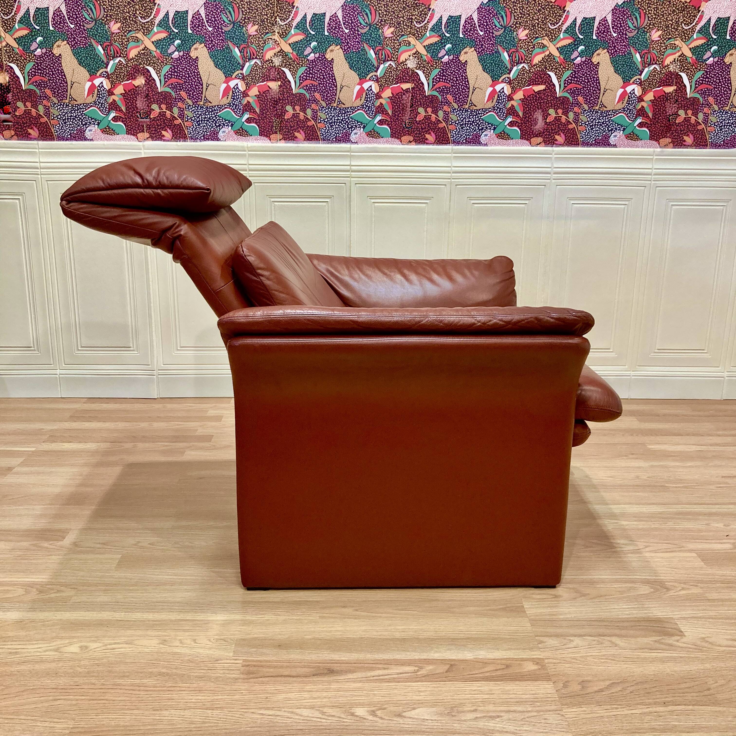 Pair of "Erpo" designer adjustable leather armchairs.