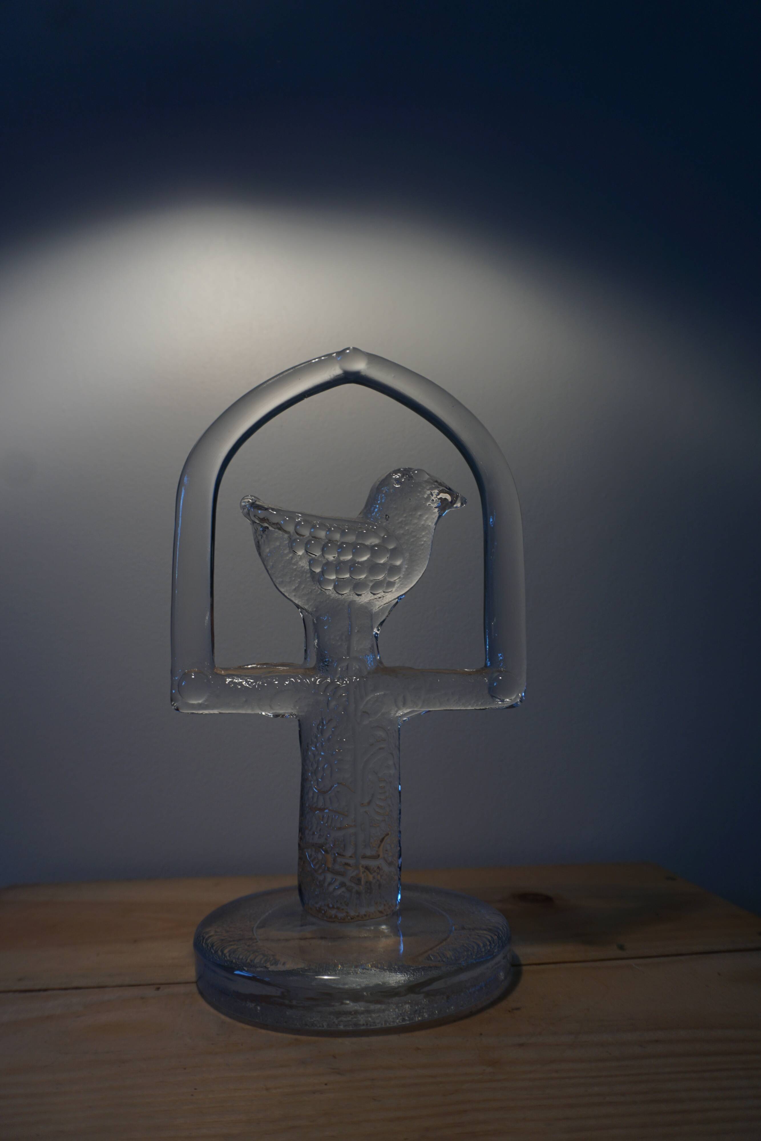 Glass bird suncatcher sculpture