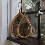 Vintage teardrop rattan mirror