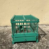 Vintage bird cage in green wood retro paint
