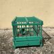 Vintage bird cage in green wood retro paint